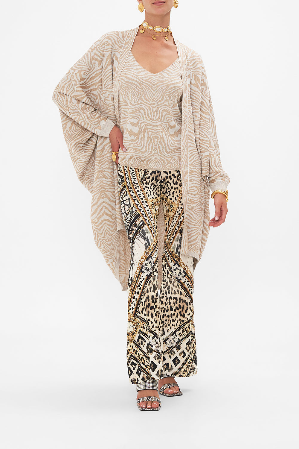 Style view of model wearing CAMILLA designer animal print knit top in Mosaic Muse 