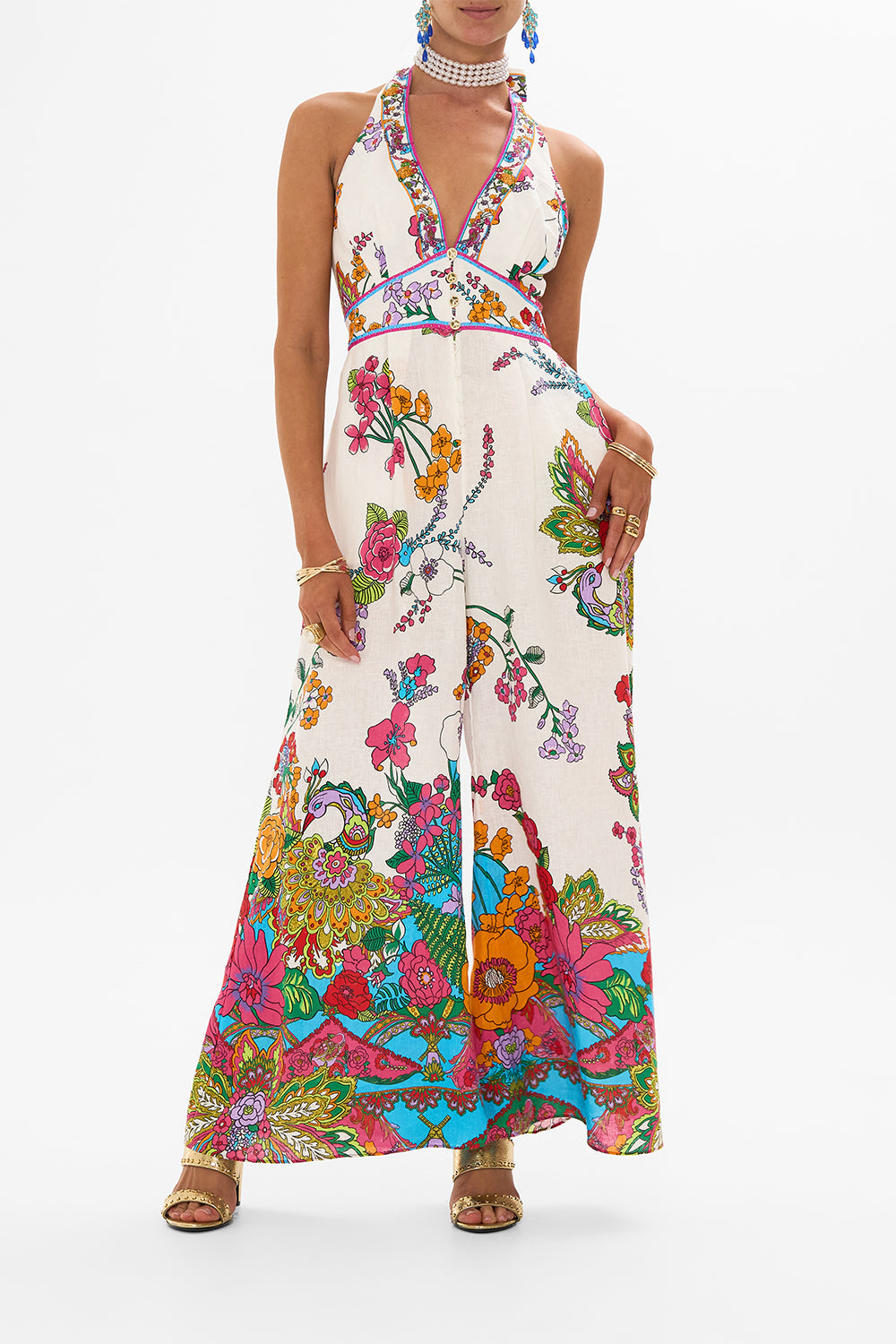 CAMILLA retro floral halterneck jumpsuit in Cosmic Prairie print. 