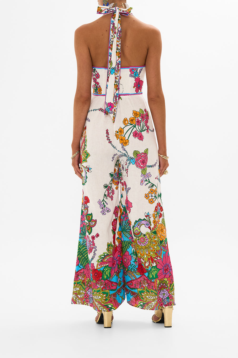 CAMILLA retro floral halterneck jumpsuit in Cosmic Prairie print. 